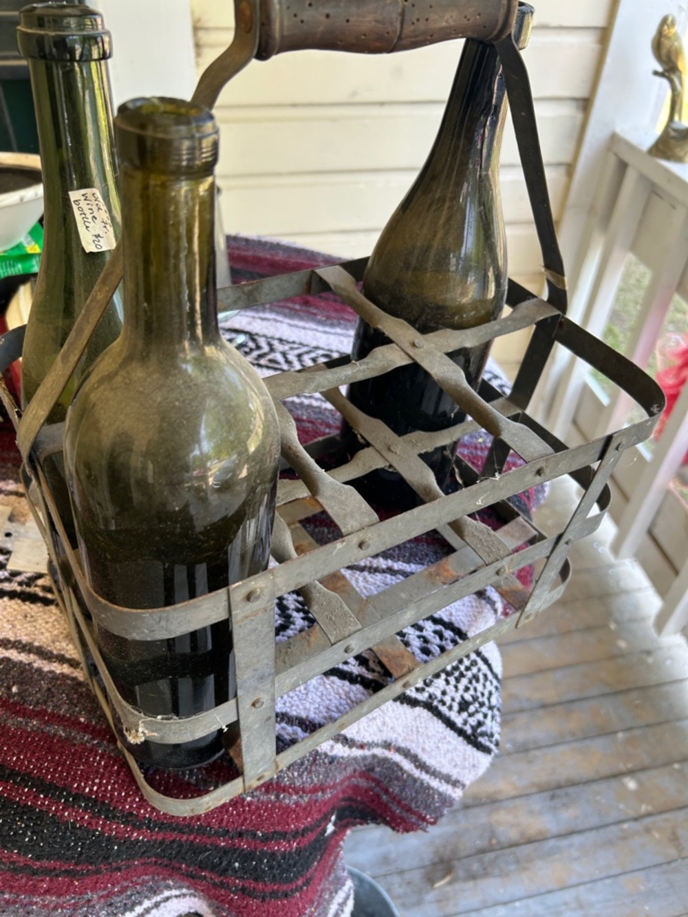 Vintage metal French wine bottle holder with 2 vintage bottles
